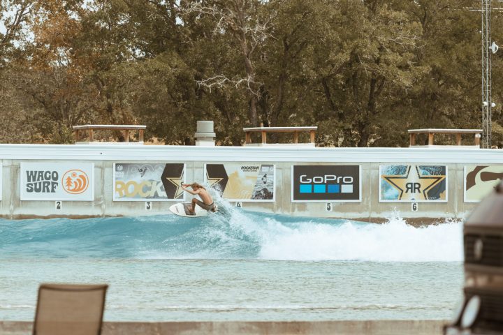 image of a person surfing on a wave at waco surf a texas water park